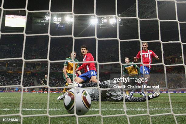 Marko Pantelic of Serbia scores his side's first goal past Mark Schwarzer of Australia during the 2010 FIFA World Cup South Africa Group D match...