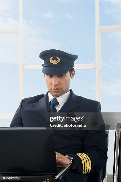 Pilot Using Computer Pilot Laptop Photos and Premium High Res Pictures - Getty Images