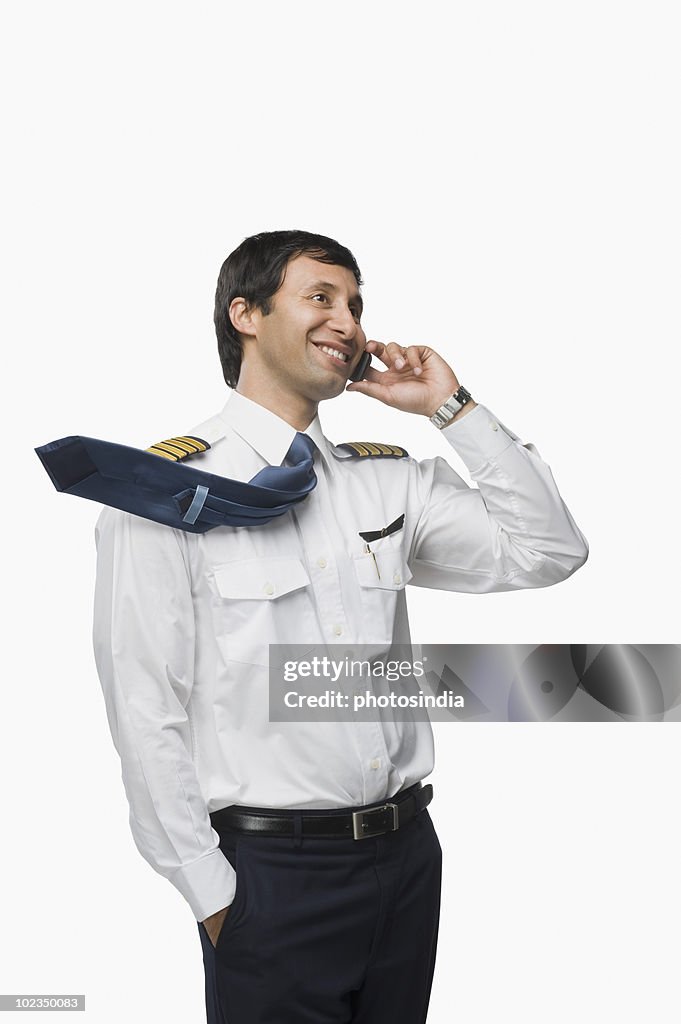 Pilot talking on a mobile phone