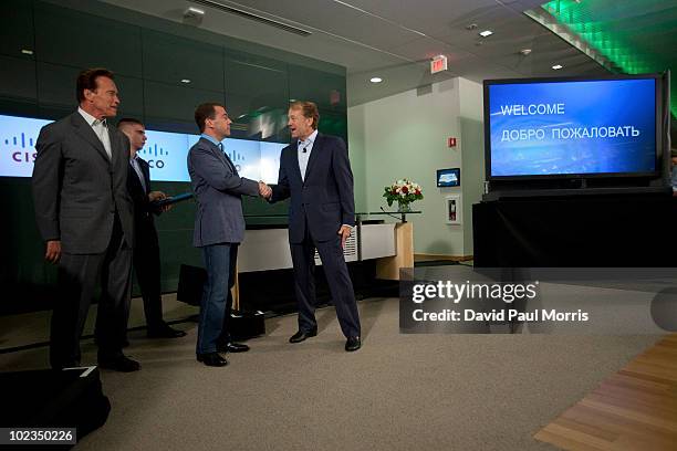 Russian President Dmitry Medvedev meets with Cisco Chairman and CEO John Chambers and California Gov. Arnold Schwarzenegger at Cisco headquarters...