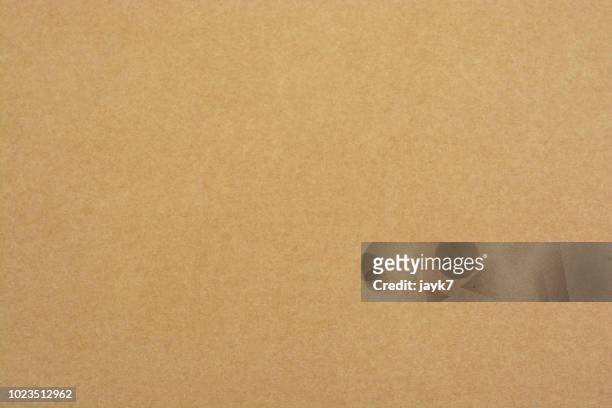 brown colored paper background - cardboard ストックフォトと画像