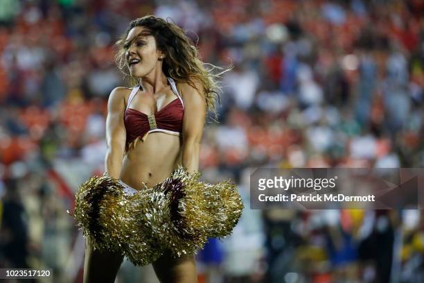 Washington Redskins cheerleader performs during a preseason game between the New York Jets and Washington Redskins at FedExField on August 16, 2018...