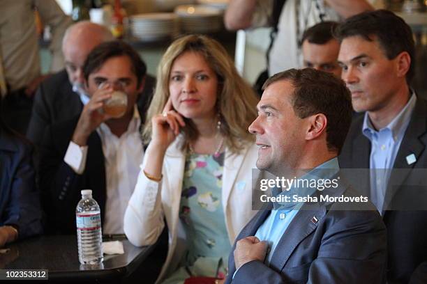 Russian President Dmitry Medvedev meets with Russians by origin, who work in Silicon Valley, at a cafe during Medvedev's visit to American on June...