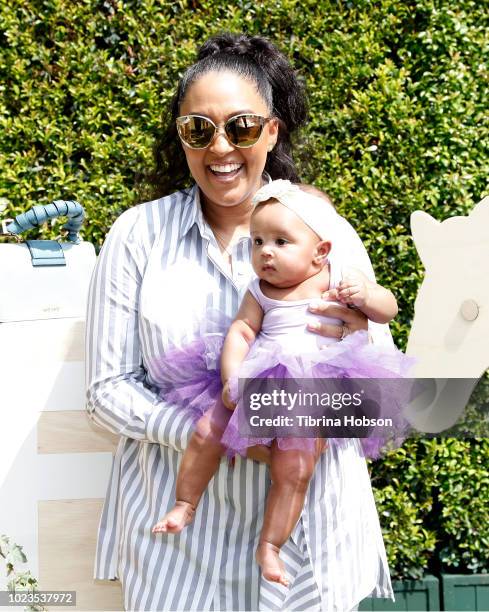 Tia Mowry and her daughter, Cree Taylor Hardrict, attend a Back-To-School block party at The Park at The Grove on August 25, 2018 in Los Angeles,...