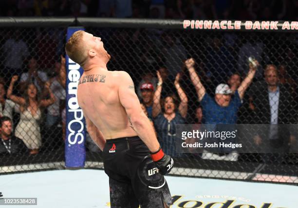 Justin Gaethje celebrates after his knockout victory over James Vick in their lightweight fight during the UFC Fight Night event at Pinnacle Bank...