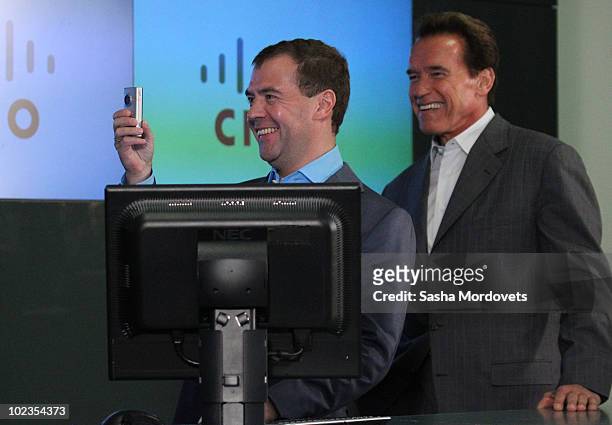 Russian President Dmitry Medvedev meets with California Governor Arnold Schwarzenegger at the CISCO company offices on June 23, 2010 in San Jose,...