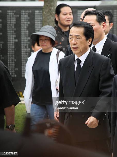 Japanese Prime Minister Naoto Kan visits the "Heiwa no Ishiji" Monument at the Peace Memorial Park on June 23, 2010 in Itoman, Japan. Naoto Kan was...