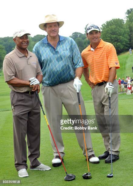 Ozzie Smith, Chris Berman and Doug Flutie attend the 2010 Travelers Celebrity Pro-Am at the TPC River Highlands on June 23, 2010 in Cromwell,...