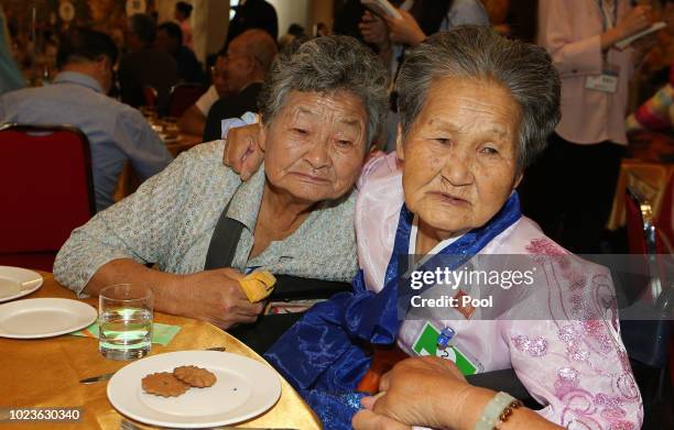 North Korean Kang Ho-Rye, 89 hugs with her South Korean relatives, as they bid farewell at the last meeting of a separated family reunion at the...