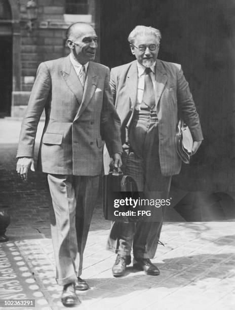 French Prime Minister Paul Ramadier leaving the Elysee Palace, with Minister of Justice Andre Marie after a meeting of the Council of State, Paris,...