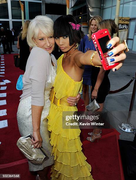 Actresses Helen Mirren and Bai Ling arrive at the premiere of E1 Entertainment's "Love Ranch" at the Arclight Theater on June 23, 2010 in Los...