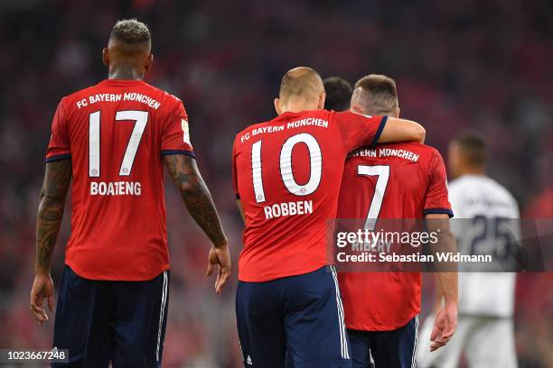 Arjen Robben of Bayern Muenchen hugs teammate Franck Ribery during the Bundesliga match between FC Bayern Muenchen and TSG 1899 Hoffenheim at Allianz...