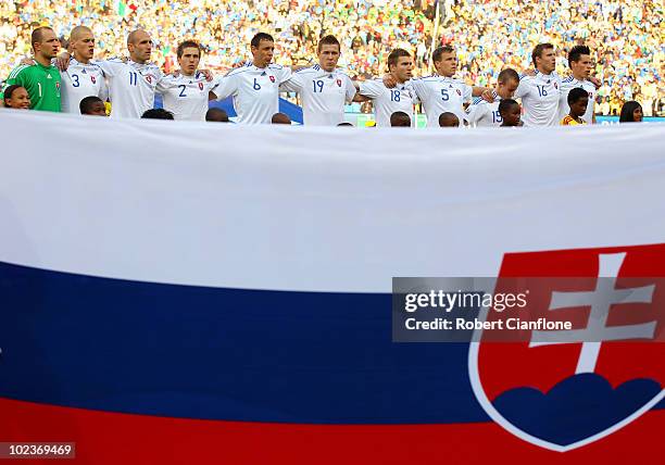 The Slovakia team line up for the national anthems prior to the 2010 FIFA World Cup South Africa Group F match between Slovakia and Italy at Ellis...