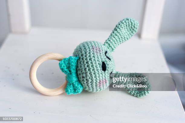 handmade crocheted rabbit rattle with a bow tie - baby rabbit stock pictures, royalty-free photos & images