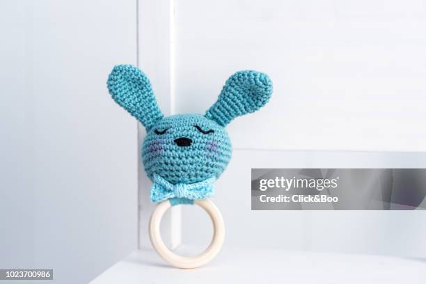 handmade crocheted rabbit rattle with a bow tie - baby rattle stock pictures, royalty-free photos & images