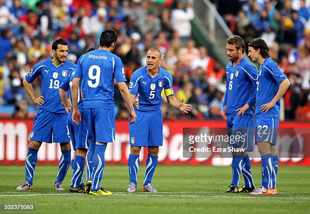 Fabio Cannavaro captain of Italy encourages his dejected team mates following the first goal by Slovakia during the 2010 FIFA World Cup South Africa...