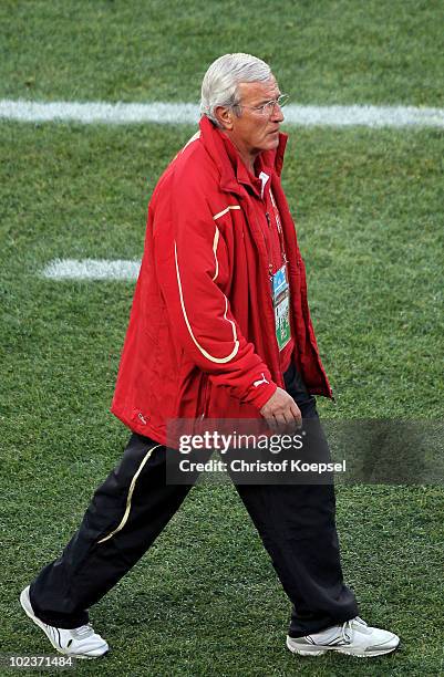 Marcello Lippi head coach of Italy walks along the touchline during the 2010 FIFA World Cup South Africa Group F match between Slovakia and Italy at...