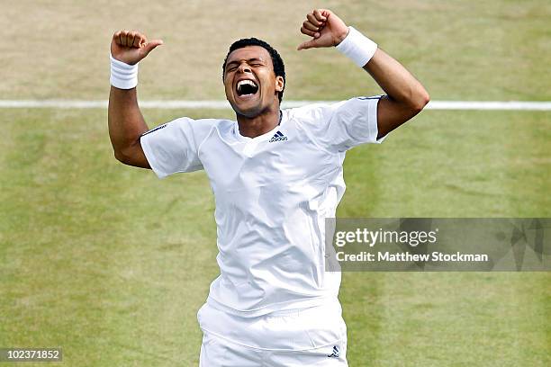 Jo-Wilfried Tsonga of France celebrates after winning his second round match against Alexandr Dolgopolov of Ukraine on Day Four of the Wimbledon Lawn...