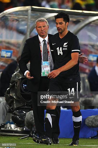 Ricki Herbert head coach of New Zealand pats Rory Fallon on the back after substituting him during the 2010 FIFA World Cup South Africa Group F match...