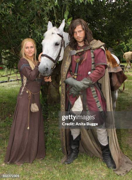 Actress Jeanette Biedermann and actor and Sebastian Stroebel pose for the press during a photocall for the historical drama TV production 'Isenhart'...