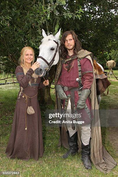 Actress Jeanette Biedermann and actor and Sebastian Stroebel pose for the press during a photocall for the historical drama TV production 'Isenhart'...