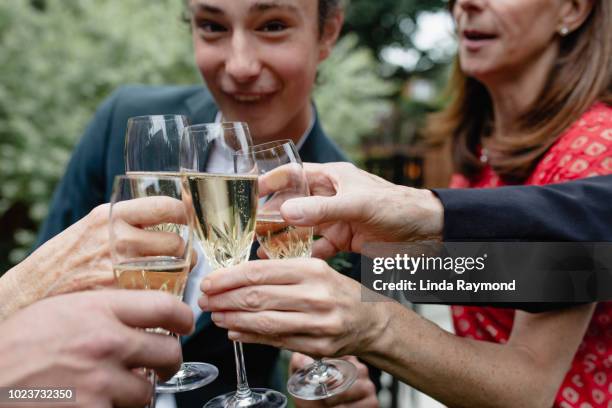 celebratory toast - graduation party stock-fotos und bilder