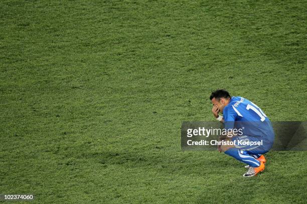 Fabio Quagliarella of Italy is dejected after being knocked out of the competition by Slovakia during the 2010 FIFA World Cup South Africa Group F...