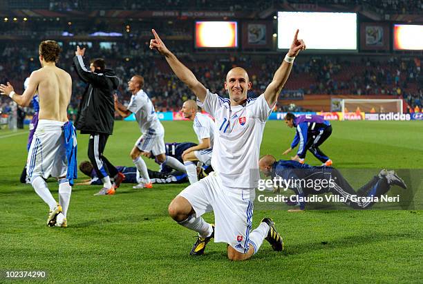 Robert Vittek of Slovakia celebrates victory with team mates after knocking Italy out of the competition during the 2010 FIFA World Cup South Africa...