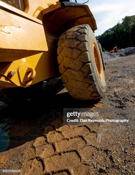 Contractor Loading 360 Contractor Loading Truck Stock Photos, High-Res Pictures, and ...
