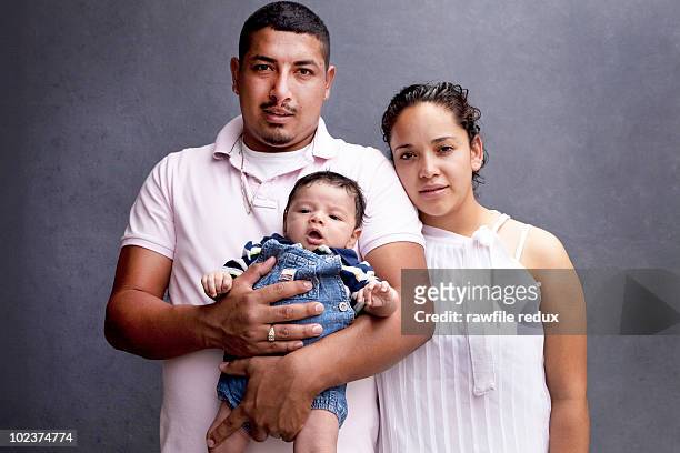 portrait of parents with their baby - baby studio bildbanksfoton och bilder