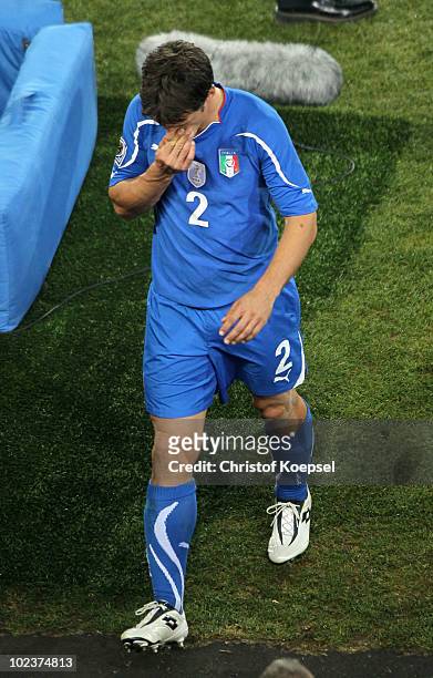 Cristian Maggio of Italy leaves the field dejected after being knocked out of the competition by Slovakia during the 2010 FIFA World Cup South Africa...