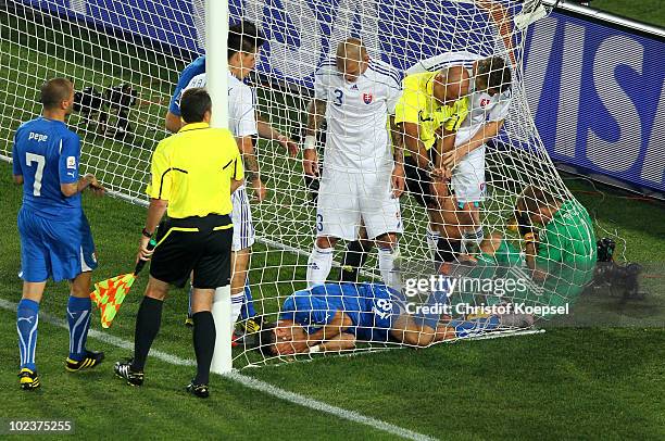 Referee Howard Webb intervenes in a scuffle between Fabio Quagliarella of Italy and Jan Mucha of Slovakia following Italy's first goal, during the...