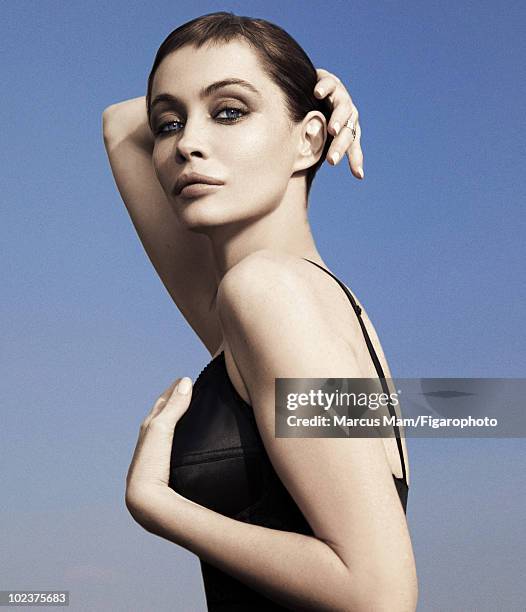 Actress Emmanuelle Beart poses at a portrait session for Madame Figaro Magazine in Paris, April 2010. Lingerie by Dolce & Gabbana, jewelry by...