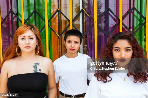 Portrait of three young Latina women