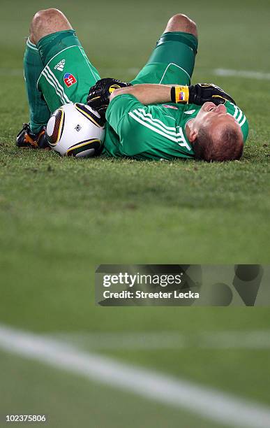 Jan Mucha of Slovakia holds his arm in pain during the 2010 FIFA World Cup South Africa Group F match between Slovakia and Italy at Ellis Park...