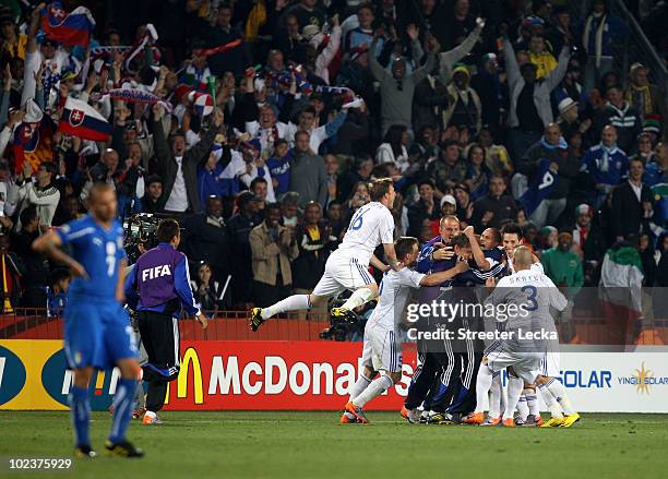 Slovakia players celebrate after Kamil Kopunek scored his team's third goal during the 2010 FIFA World Cup South Africa Group F match between...