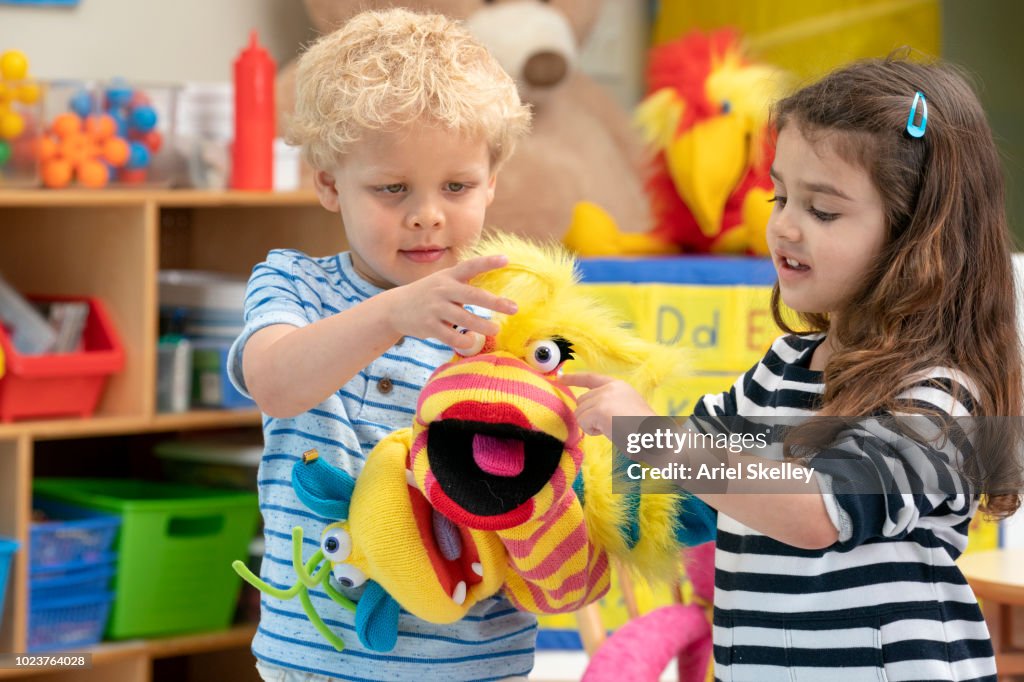 Using Puppets Children Playing With Puppets In Classroom High-Res Stock Photo - Getty ...