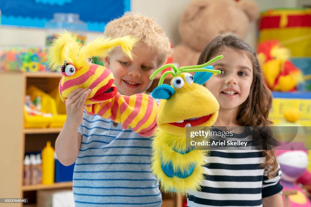 Using Puppets Children Playing With Puppets In Classroom High-Res Stock Photo - Getty ...