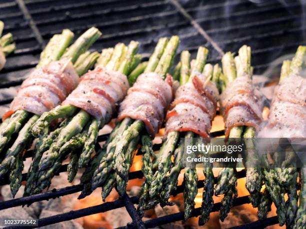 bacon wrapped asparagus on a fiery grill, ketogenic food - prosciutto wrapped stock pictures, royalty-free photos & images