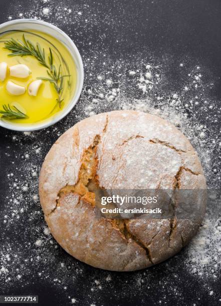 traditional fresh bread, garlic and olive oil - round loaf stock pictures, royalty-free photos & images