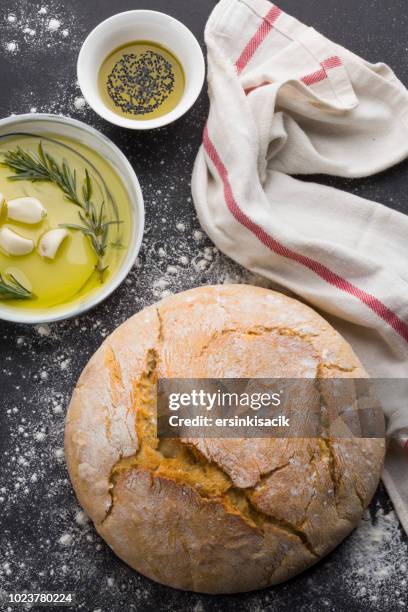 traditional fresh bread, garlic and olive oil - round loaf stock pictures, royalty-free photos & images