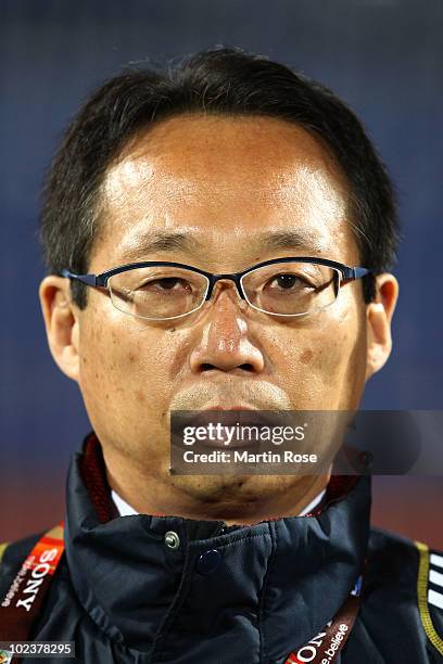 Takeshi Okada head coach of Japan looks on prior to the 2010 FIFA World Cup South Africa Group E match between Denmark and Japan at the Royal...