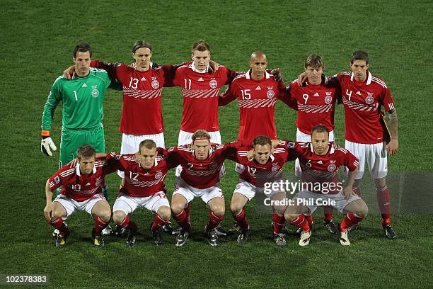 The Denmark team pose for a group photo prior to the 2010 FIFA World Cup South Africa Group E match between Denmark and Japan at the Royal Bafokeng...