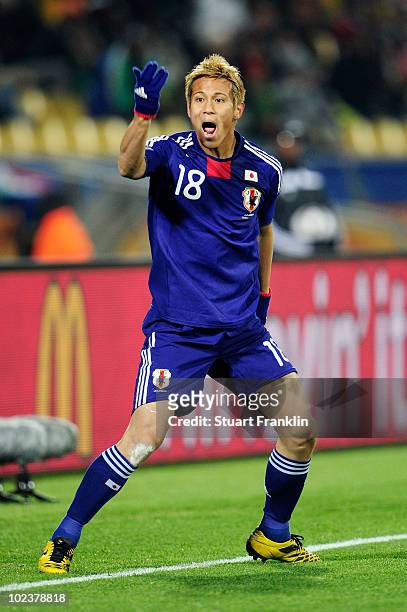 Keisuke Honda of Japan reacts during the 2010 FIFA World Cup South Africa Group E match between Denmark and Japan at the Royal Bafokeng Stadium on...