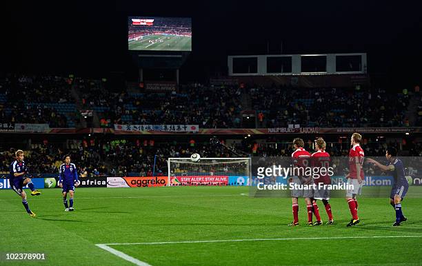 Keisuke Honda of Japan scores the opening goal from a free kick during the 2010 FIFA World Cup South Africa Group E match between Denmark and Japan...