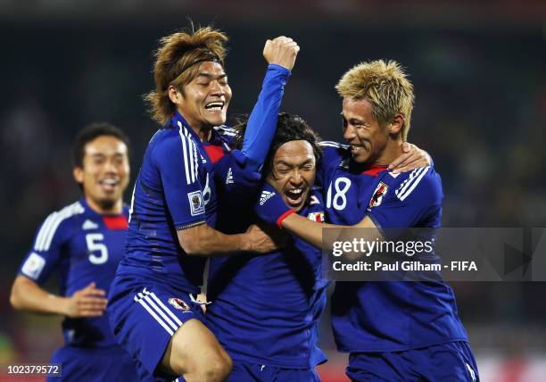 Yasuhito Endo of Japan celebrates scoring their second goal during the 2010 FIFA World Cup South Africa Group E match between Denmark and Japan at...