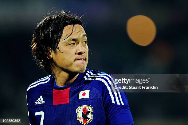 Yasuhito Endo of Japan looks over his shoulder during the 2010 FIFA World Cup South Africa Group E match between Denmark and Japan at the Royal...