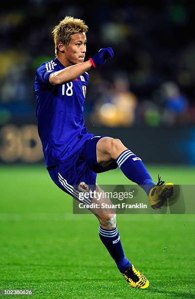 Keisuke Honda of Japan in action during the 2010 FIFA World Cup South Africa Group E match between Denmark and Japan at the Royal Bafokeng Stadium on...