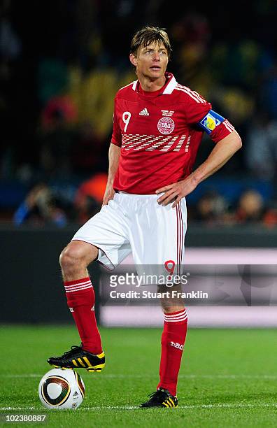 Jon Dahl Tomasson of Denmark looks on after the first goal by Japan during the 2010 FIFA World Cup South Africa Group E match between Denmark and...