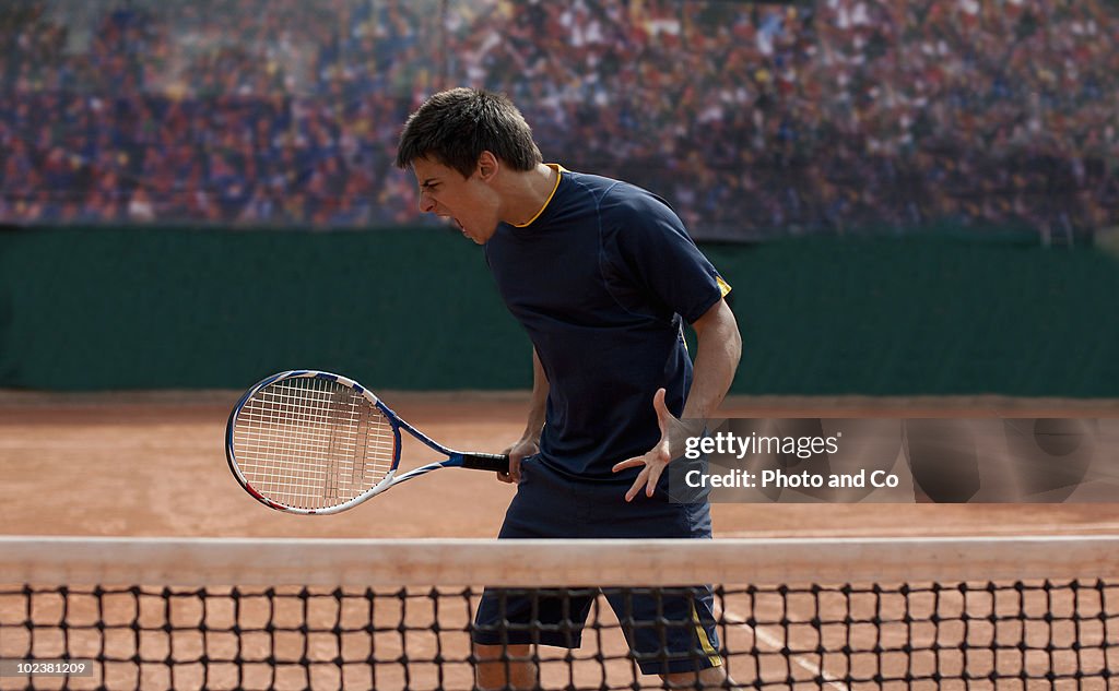 Tennis player on clay court